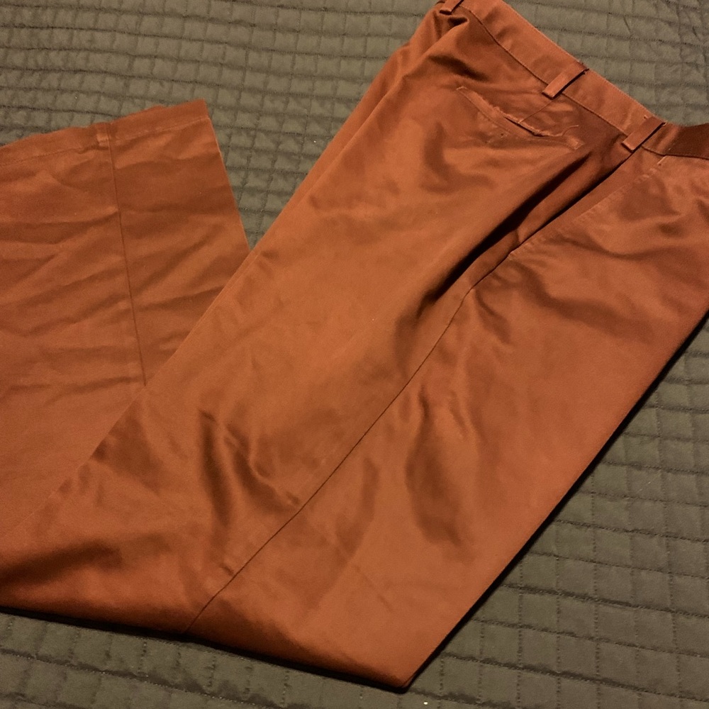 Men’s pants. Jos. A. Bank tailored fit burgundy pants. Travelers collection.